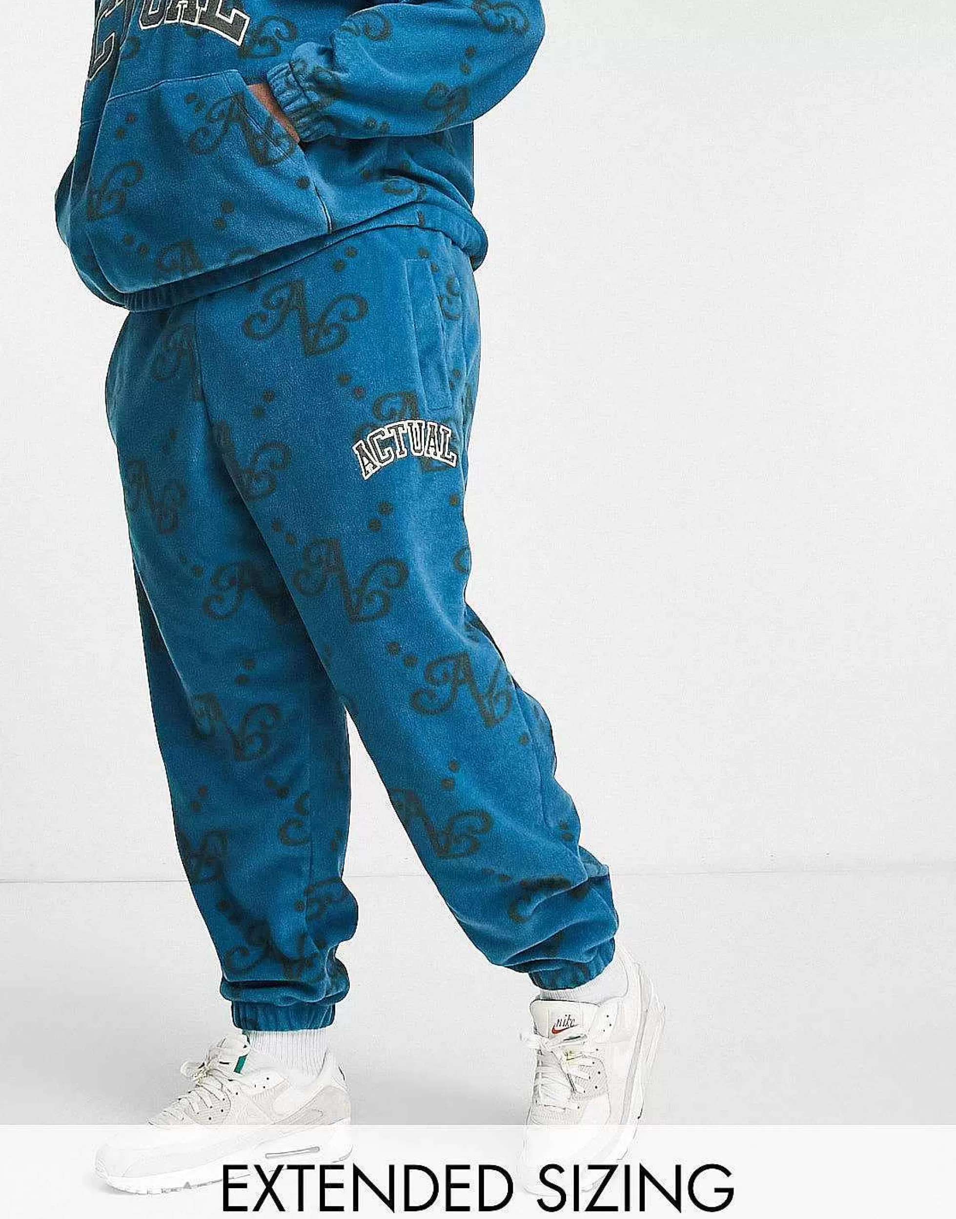 Men DESIGN Actual Co-Ord Relaxed Polar Fleece Joggers With All Over Print And Applique Logo In