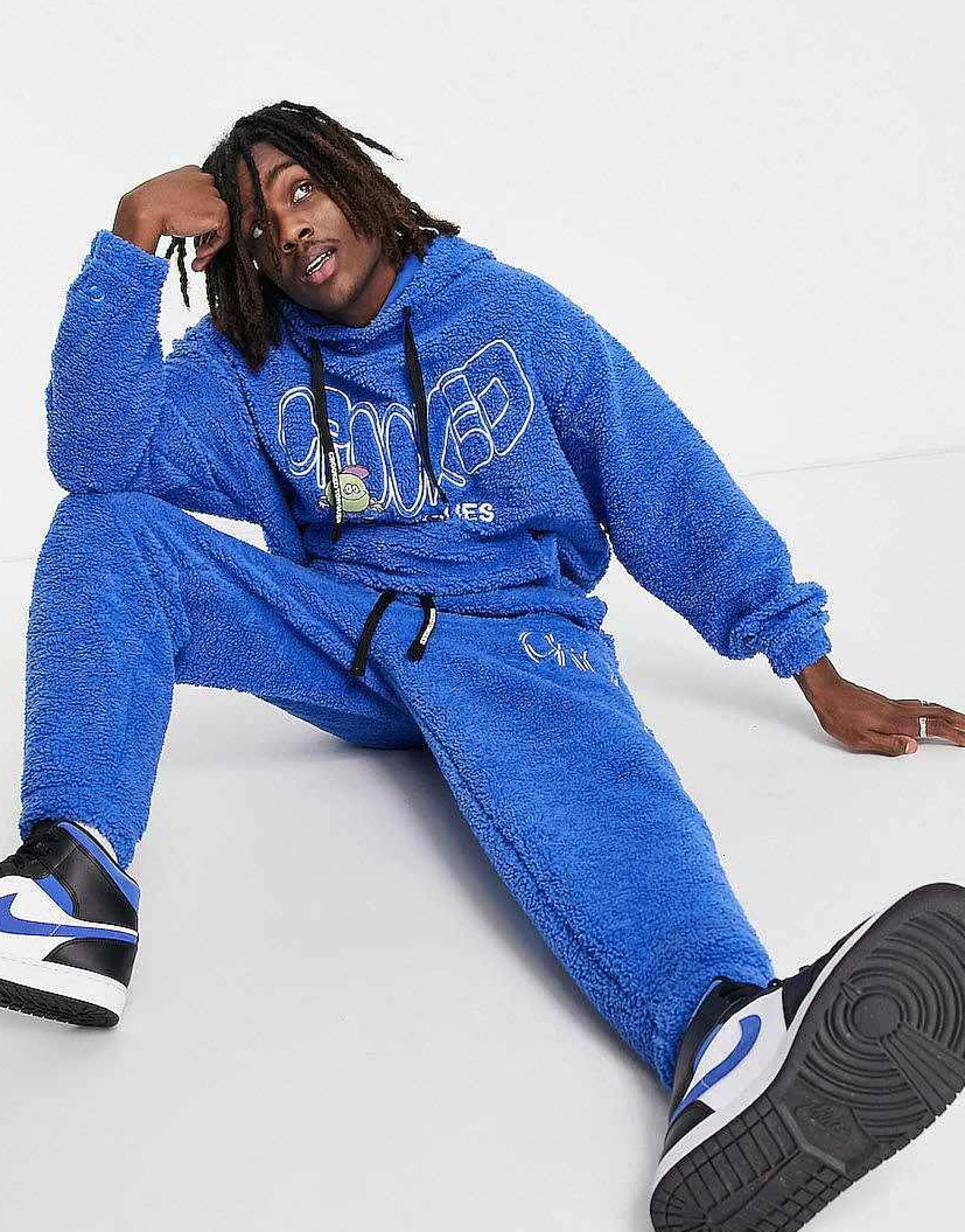 Men Crooked Tongues Co-Ord In Teddy Borg With Logo And Character Embroidery In Blue