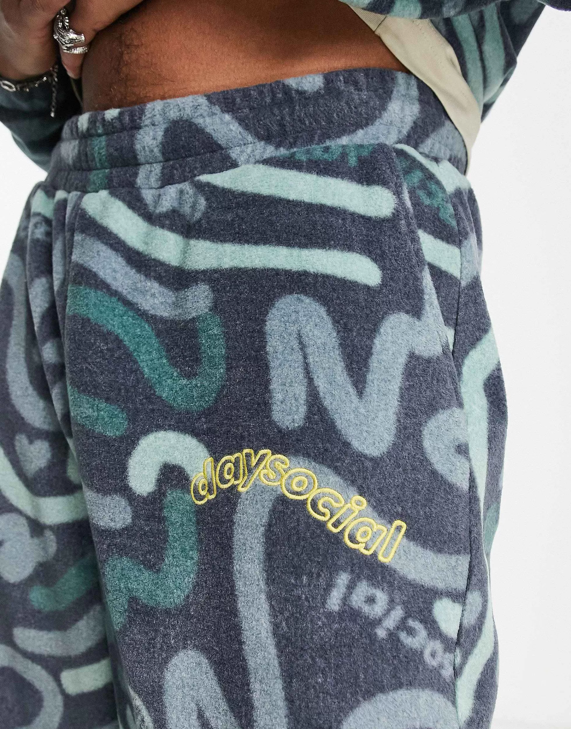 Men DESIGN Daysocial Co-Ord Relaxed Joggers In Polar Fleece With All Over Doodle Print In