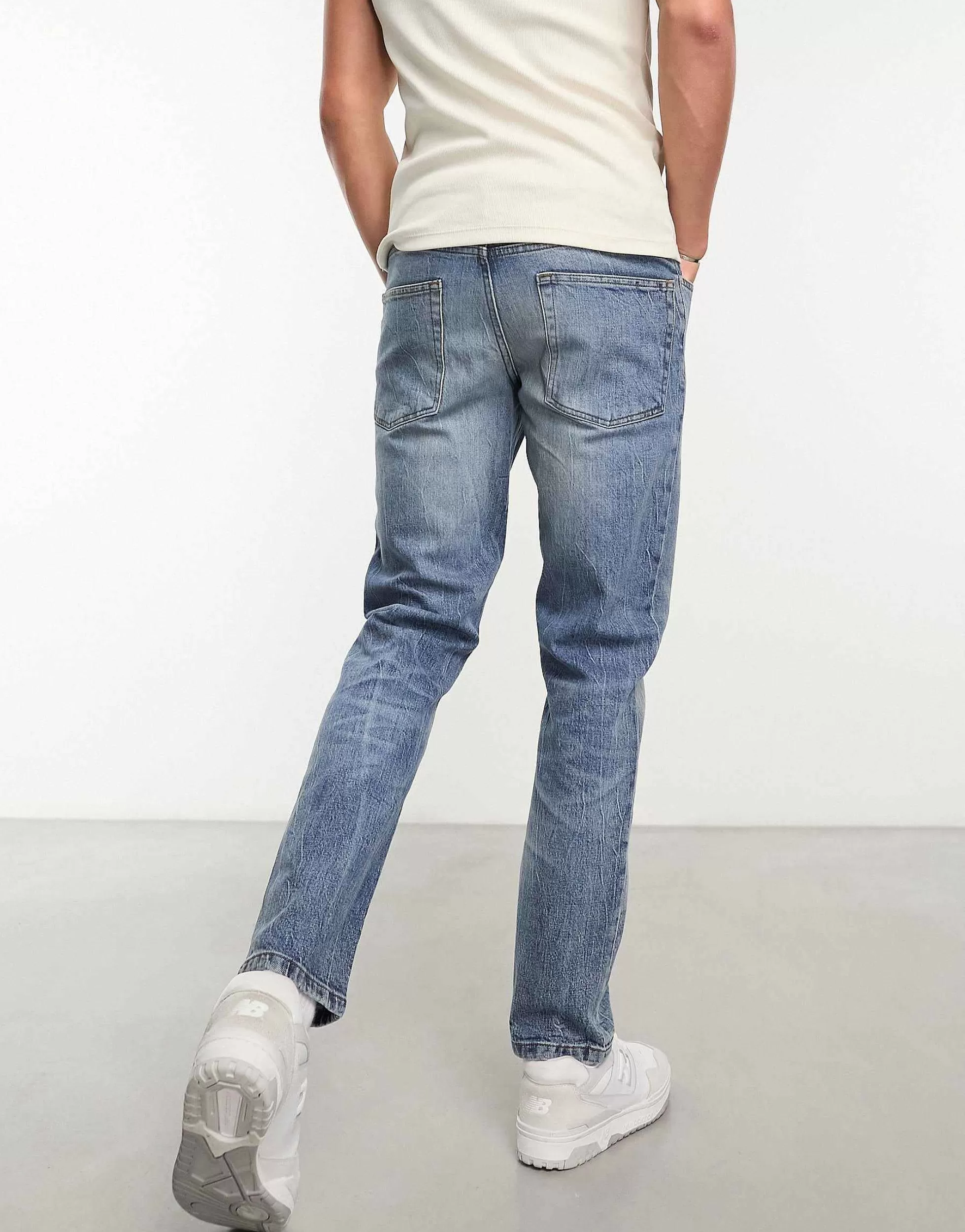 Men DESIGN Stretch Slim Jeans In Vintage Light Wash