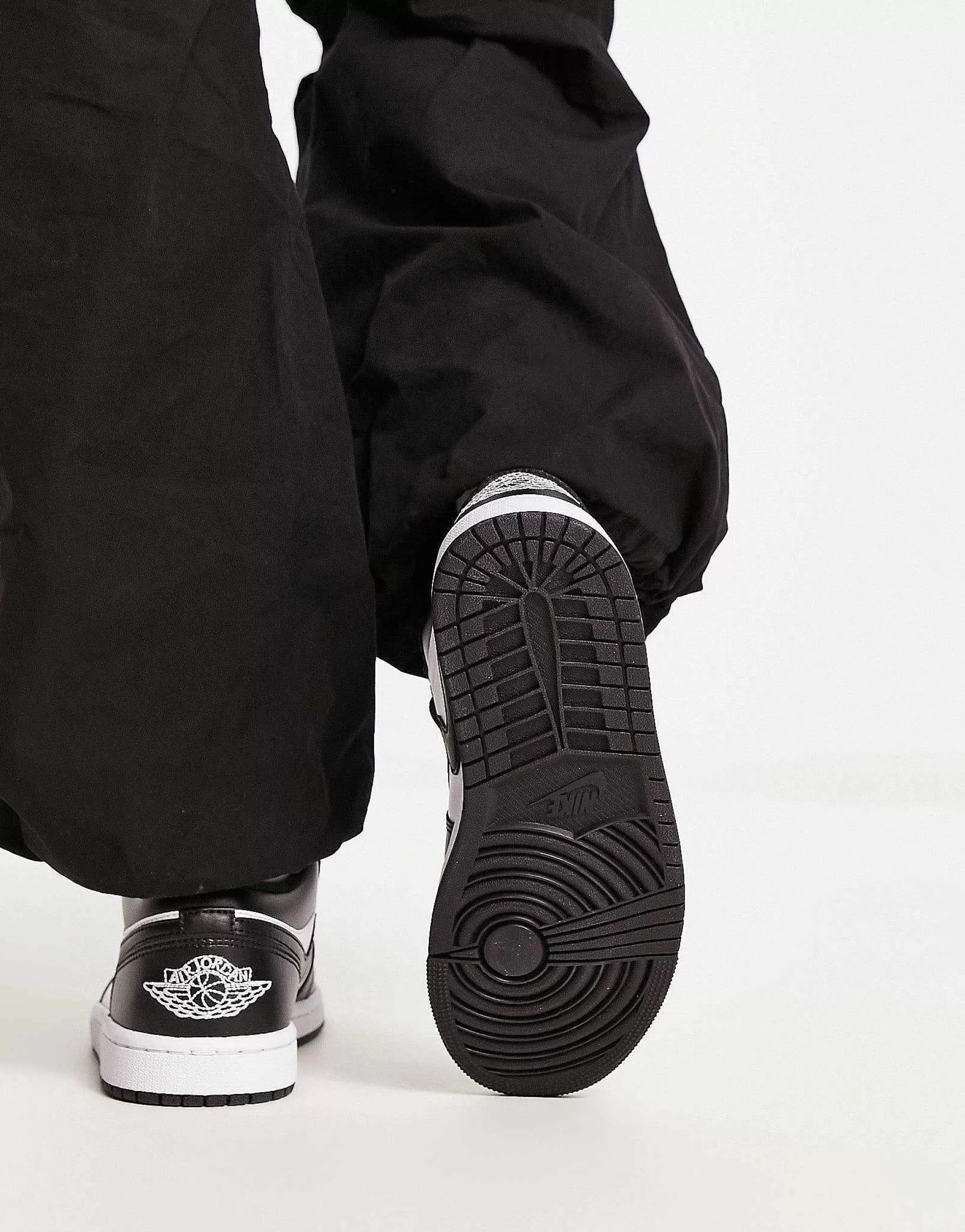 Women Jordan Aj1 Low Trainers In And Black